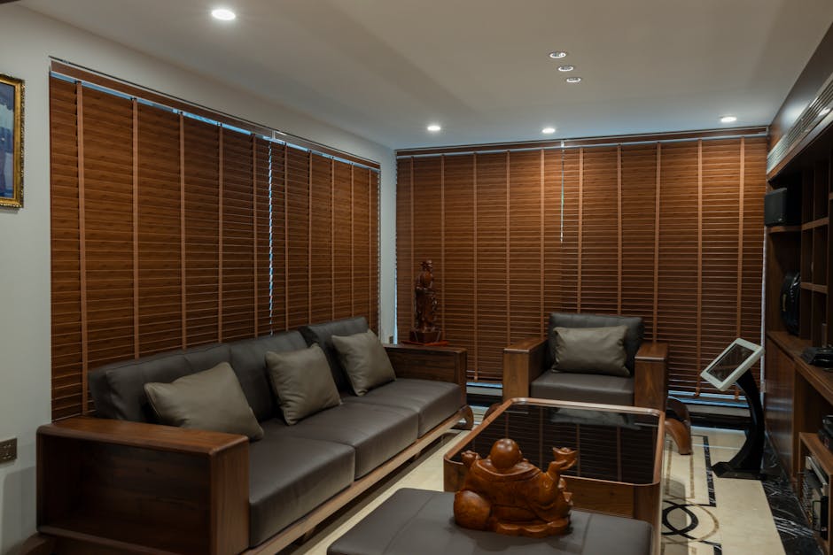 Modern living room showcasing premium custom window treatments